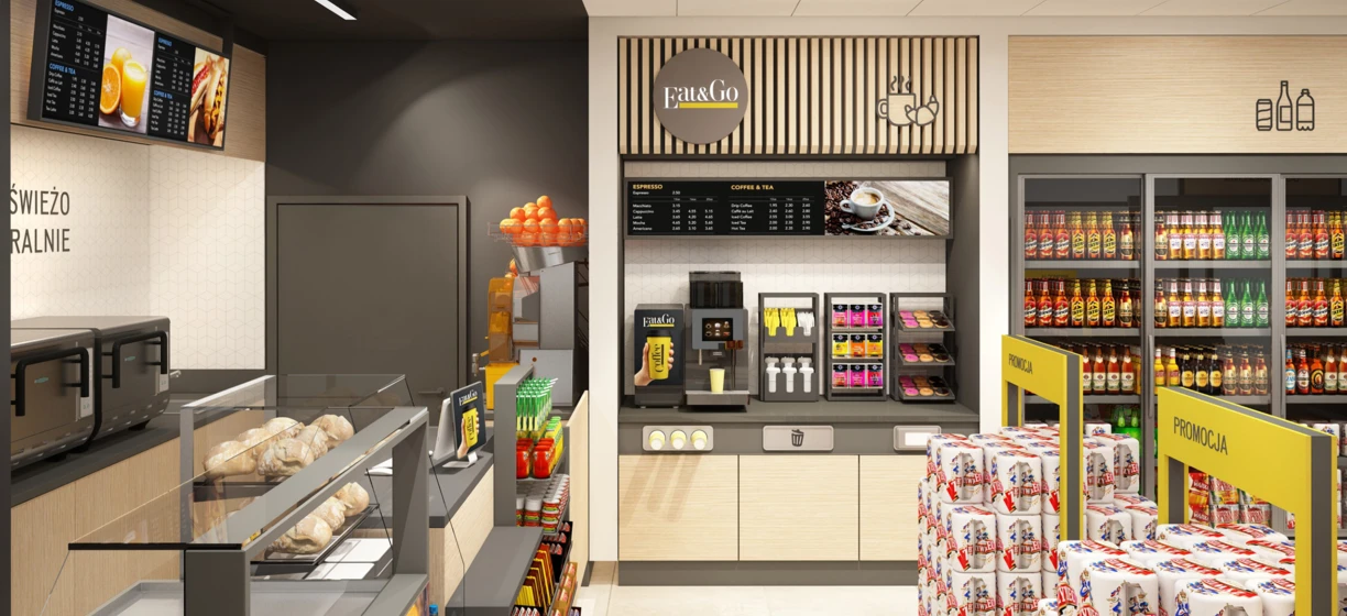 Shelving display at convenience store with various food items for sale, including coffee and tea. Promotions for Fat&Go products and fresh groceries.