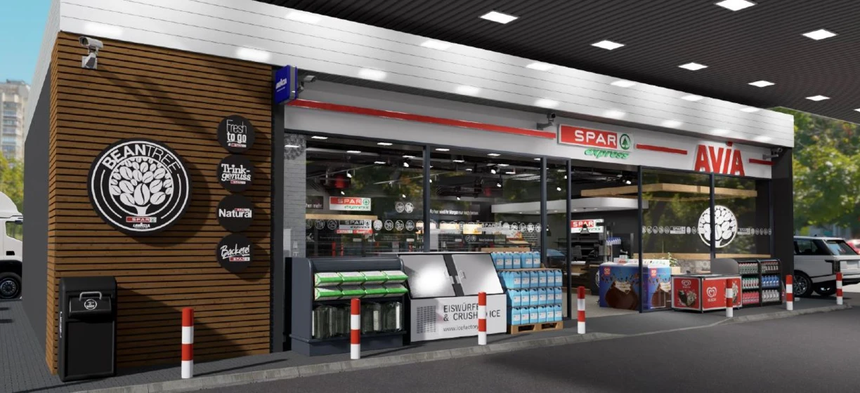 Logo dla SPAR Express reklamujący artykuły sklepu convenience, w tym napoje, lód i przekąski na półkach w restauracji fast food.