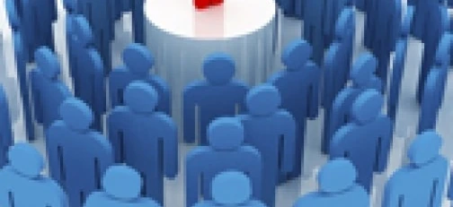 Zróżnicowany zespół specjalistów współpracujących nad projektem w nowoczesnym biurze. Słowa kluczowe: Zarządzanie, Współpraca, Nauka.