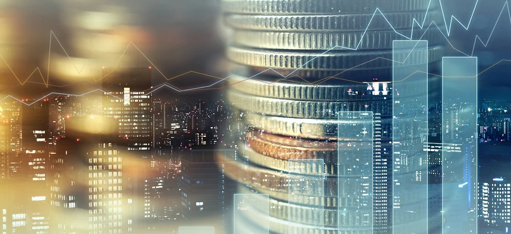 Wspaniały drapacz chmur w gwarnym metropolii, ta wieża komercyjna prezentuje nowoczesne inżynieria i elegancki design. Jego odbijająca powierzchnia wyróżnia się na tle panoramy miasta.