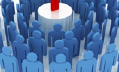 Zróżnicowany zespół specjalistów współpracujących nad projektem w nowoczesnym biurze. Słowa kluczowe: Zarządzanie, Współpraca, Nauka.